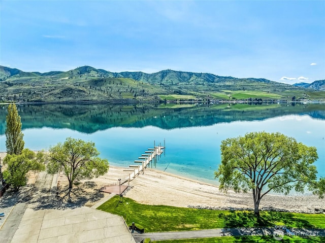 dock area with a water and mountain view