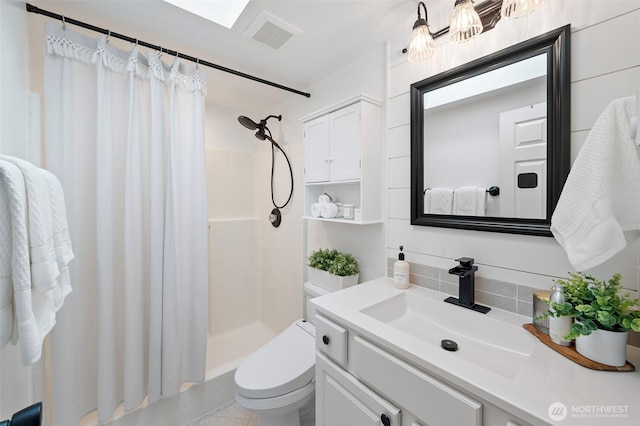 bathroom with backsplash, visible vents, a shower stall, vanity, and toilet