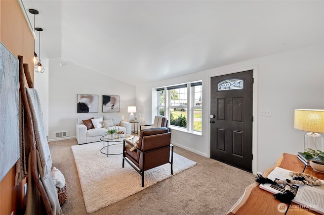 living area featuring carpet flooring, baseboards, visible vents, and lofted ceiling