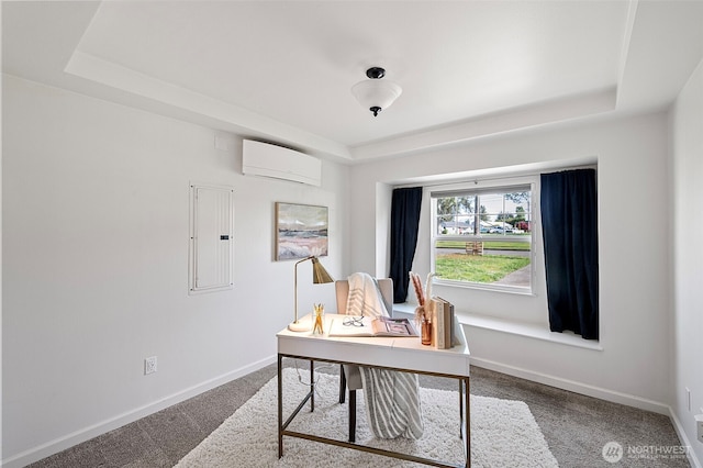 office area featuring carpet flooring, a wall mounted AC, a raised ceiling, and electric panel