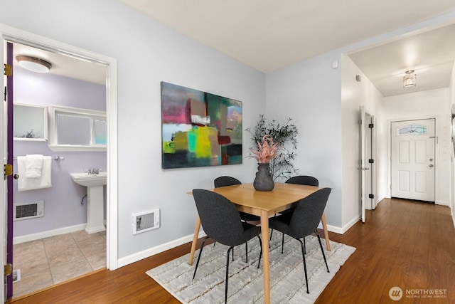 6357 37th Ave SW, Seattle, WA 98126 - dining area featuring wood finished floors and baseboards