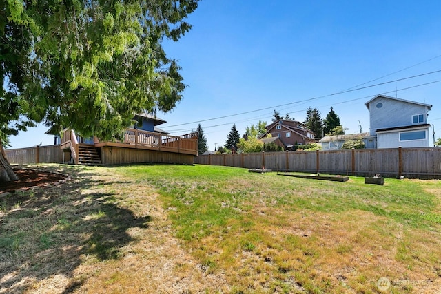 6357 37th Ave SW, Seattle, WA 98126 - view of yard with a deck and stairs