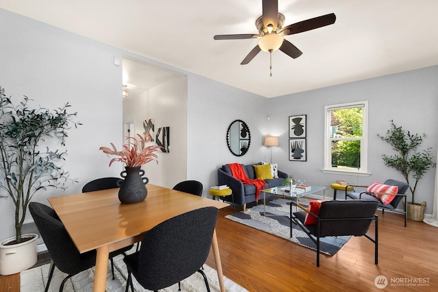 6357 37th Ave SW, Seattle, WA 98126 - dining area with light wood-style floors and a ceiling fan