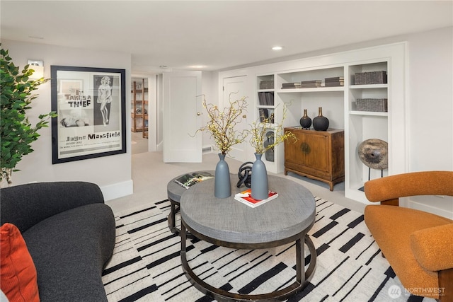 living room featuring baseboards