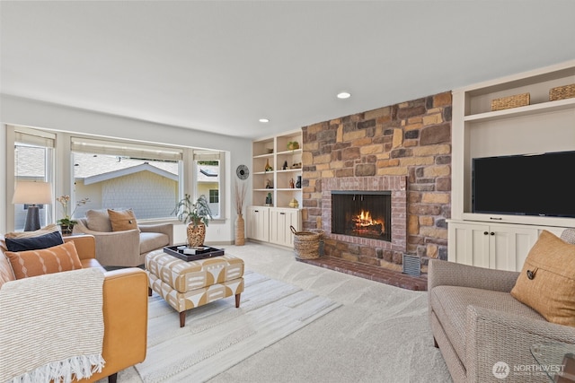 2716 58th Street Ct NW, Gig Harbor, WA 98335 - living area with a fireplace, light colored carpet, recessed lighting, and built in shelves