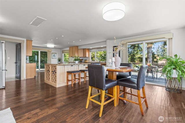 2716 58th Street Ct NW, Gig Harbor, WA 98335 - dining area with a healthy amount of sunlight, dark wood-style floors, visible vents, and recessed lighting