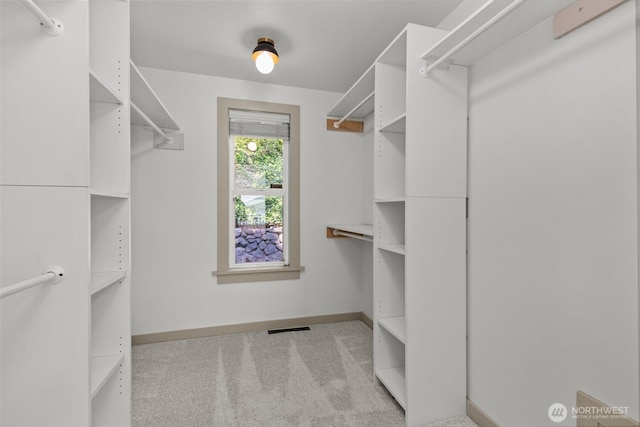 2716 58th Street Ct NW, Gig Harbor, WA 98335 - walk in closet featuring visible vents and carpet floors
