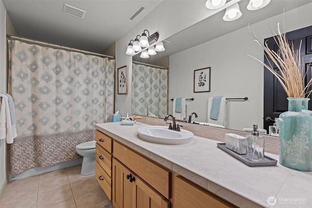 2716 58th Street Ct NW, Gig Harbor, WA 98335 - full bath with toilet, tile patterned flooring, vanity, and visible vents