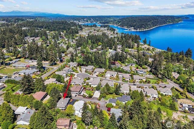 2716 58th Street Ct NW, Gig Harbor, WA 98335 - bird's eye view featuring a water view, a residential view, and a view of trees