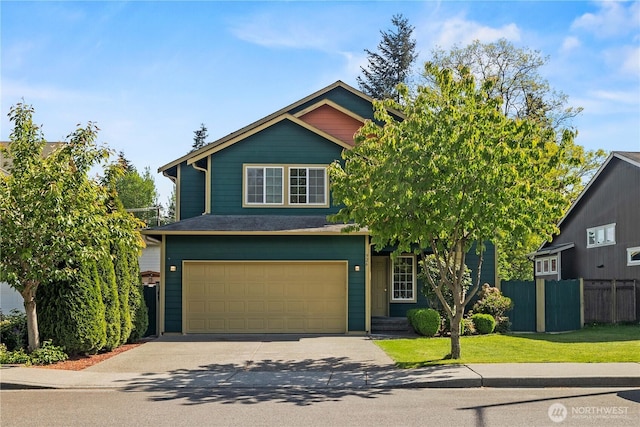 926 99th St SW, Everett, WA 98204 - view of front facade featuring fence, an attached garage, and driveway