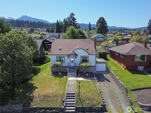 bird's eye view featuring a mountain view and a residential view