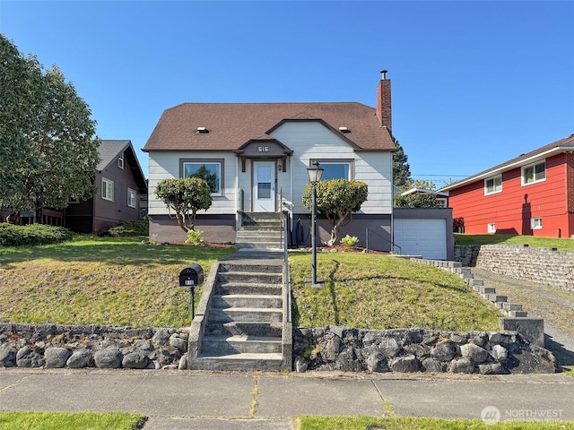 bungalow-style home with a chimney and a front yard