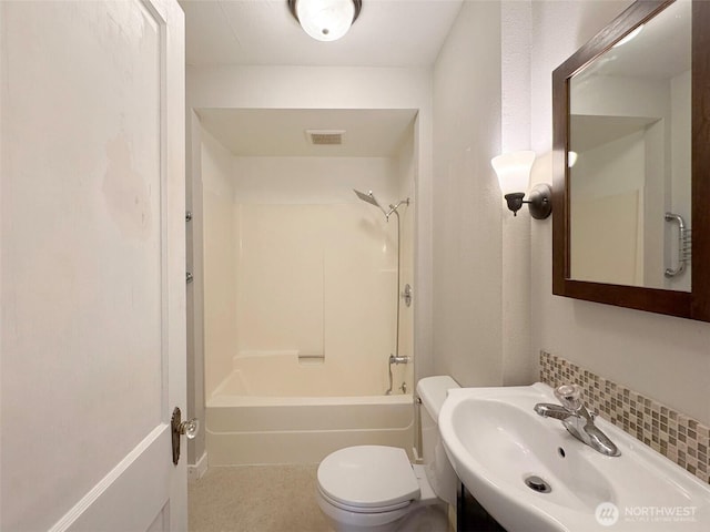 bathroom featuring toilet, washtub / shower combination, vanity, and visible vents