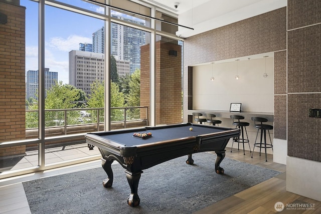 10610 NE 9th Pl Unit G403, Bellevue, WA 98004 - playroom with wood finished floors, floor to ceiling windows, a view of city, and pool table