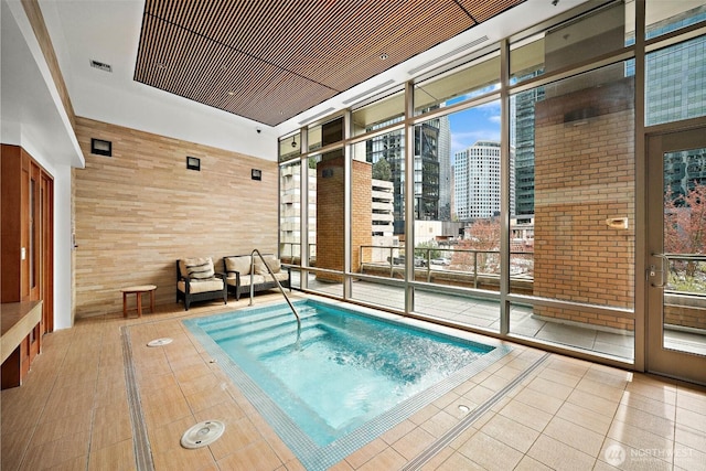 10610 NE 9th Pl Unit G403, Bellevue, WA 98004 - view of swimming pool featuring a city view and a pool