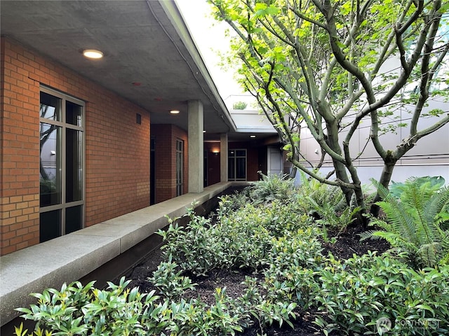 10610 NE 9th Pl Unit G403, Bellevue, WA 98004 - view of property exterior with brick siding