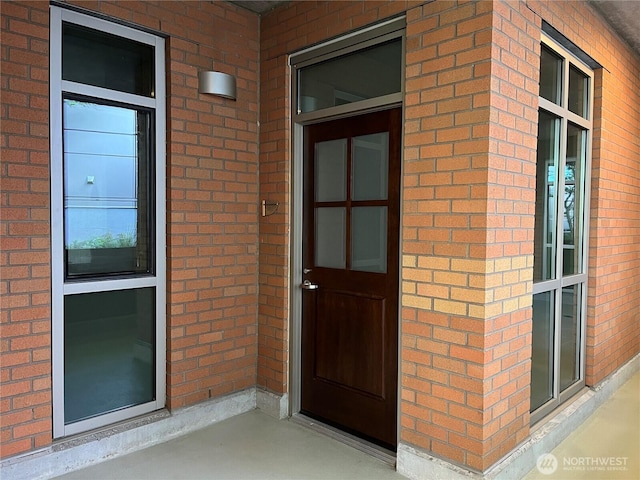 10610 NE 9th Pl Unit G403, Bellevue, WA 98004 - view of exterior entry with brick siding