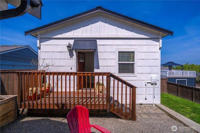 3315 N 35th St, Tacoma, WA 98407 - rear view of house with a deck and fence