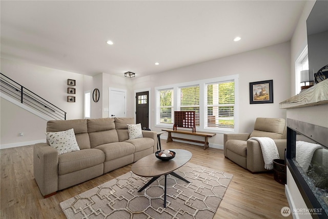 3315 N 35th St, Tacoma, WA 98407 - living room with baseboards, stairs, and wood finished floors