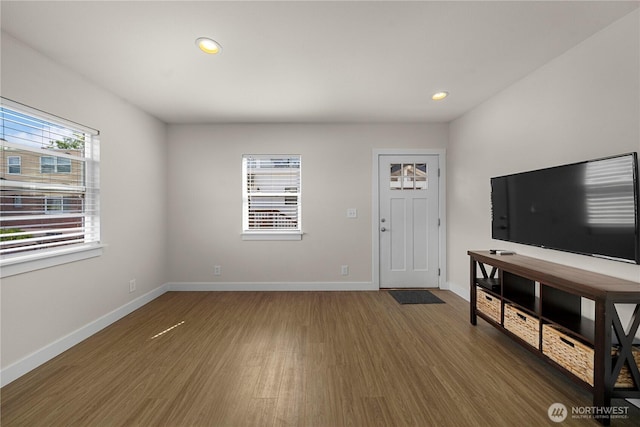 3315 N 35th St, Tacoma, WA 98407 - unfurnished living room featuring recessed lighting, baseboards, and wood finished floors