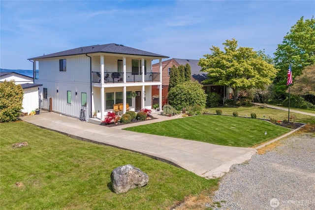 3315 N 35th St, Tacoma, WA 98407 - back of property with a yard, a balcony, and covered porch