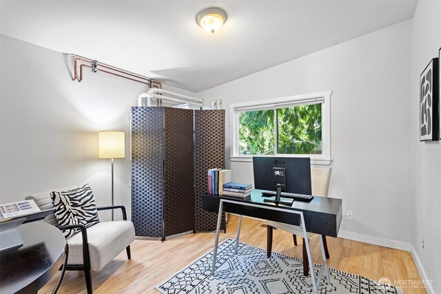 office featuring light wood-style floors and baseboards