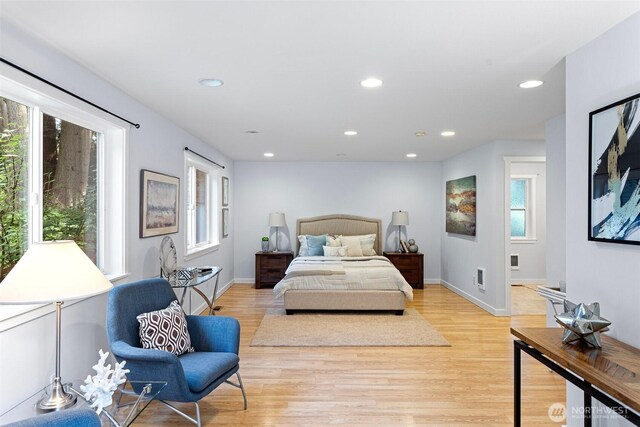 bedroom featuring recessed lighting, baseboards, and light wood finished floors