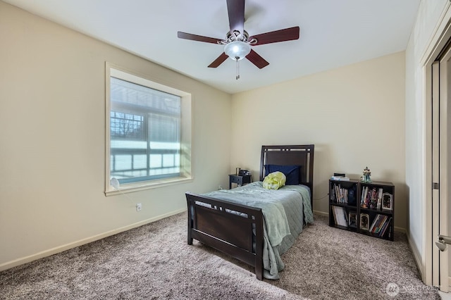320 E 32nd St Unit 105, Tacoma, WA 98404 - carpeted bedroom with ceiling fan and baseboards