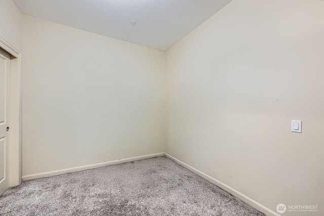 320 E 32nd St Unit 105, Tacoma, WA 98404 - carpeted empty room featuring baseboards