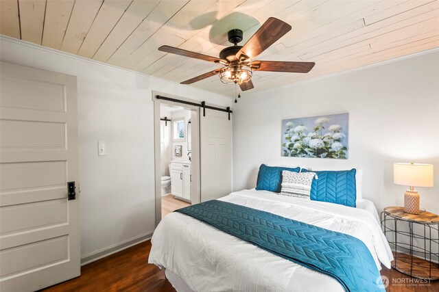 1538 7th St, Bremerton, WA 98337 - bedroom featuring crown molding, wooden ceiling, a barn door, and wood finished floors