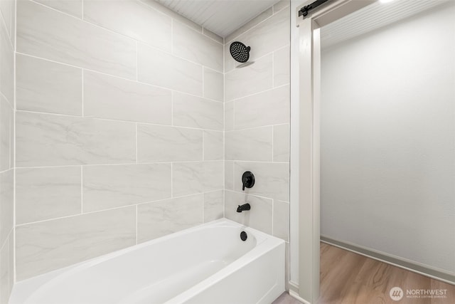 1538 7th St, Bremerton, WA 98337 - full bath with baseboards, wood finished floors, and tub / shower combination