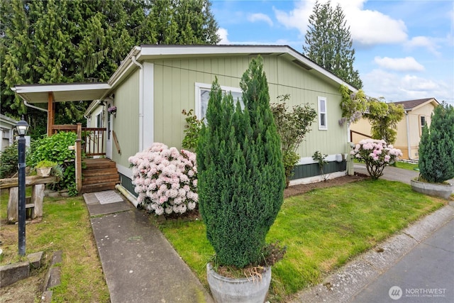 607 37th St SE Unit 92, Auburn, WA 98002 - view of home's exterior featuring a lawn