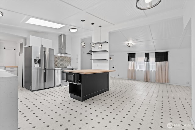 607 37th St SE Unit 92, Auburn, WA 98002 - kitchen with butcher block counters, open shelves, appliances with stainless steel finishes, dark cabinetry, and wall chimney exhaust hood