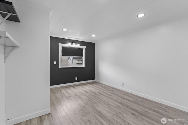 607 37th St SE Unit 92, Auburn, WA 98002 - spare room with crown molding, recessed lighting, wood finished floors, and baseboards