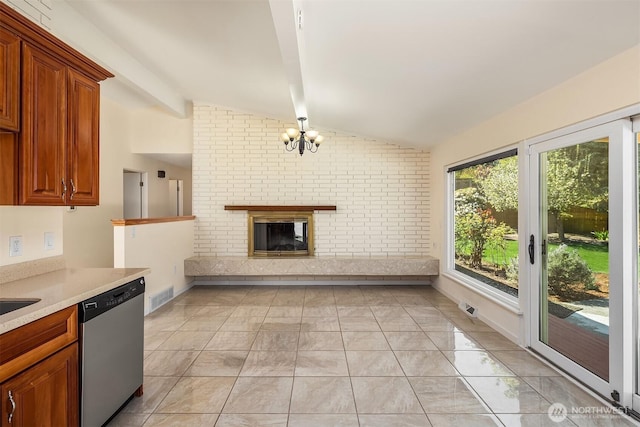 9750 SE 41st St, Mercer Island, WA 98040 - kitchen featuring light countertops, a chandelier, vaulted ceiling with beams, stainless steel dishwasher, and visible vents