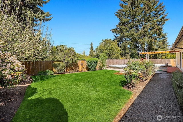 9750 SE 41st St, Mercer Island, WA 98040 - view of yard with a wooden deck and a fenced backyard