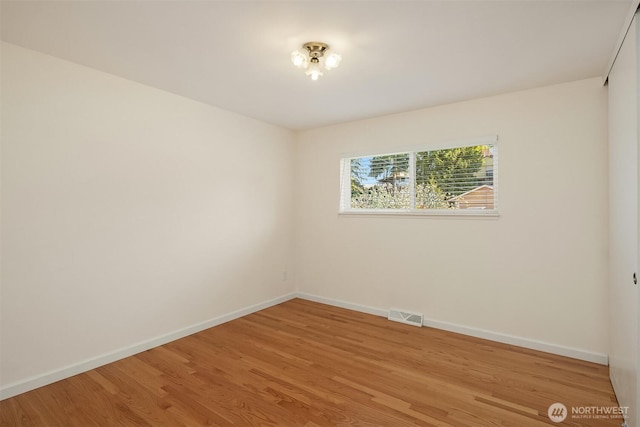 9750 SE 41st St, Mercer Island, WA 98040 - unfurnished room with visible vents, baseboards, and light wood-type flooring