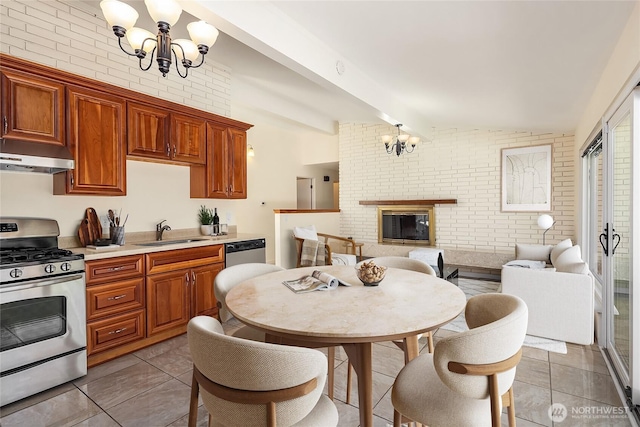 9750 SE 41st St, Mercer Island, WA 98040 - dining space with a fireplace, lofted ceiling with beams, brick wall, and a notable chandelier