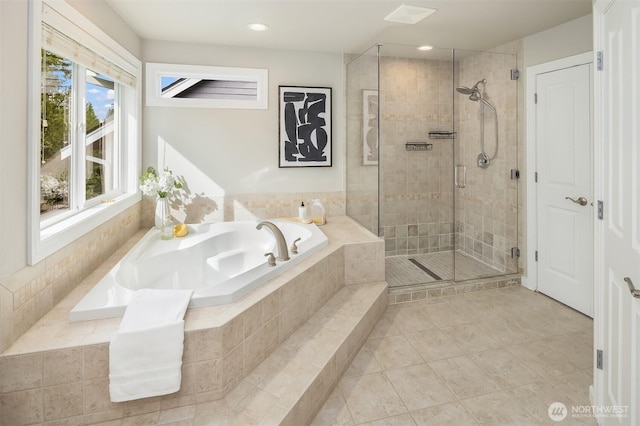full bath with tile patterned flooring, a shower stall, a garden tub, and recessed lighting