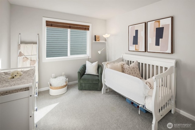 carpeted bedroom with baseboards