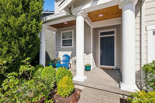 doorway to property featuring a porch
