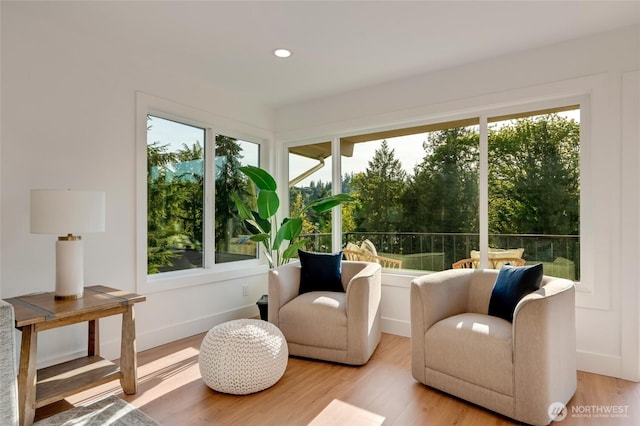 321 Bellevue Way SE Unit 401, Bellevue, WA 98004 - sunroom / solarium with recessed lighting, wood finished floors, and a wealth of natural light