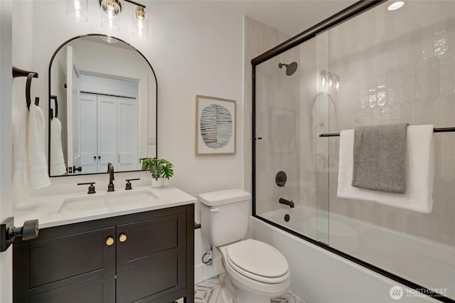 321 Bellevue Way SE Unit 401, Bellevue, WA 98004 - full bathroom with combined bath / shower with glass door, toilet, and vanity