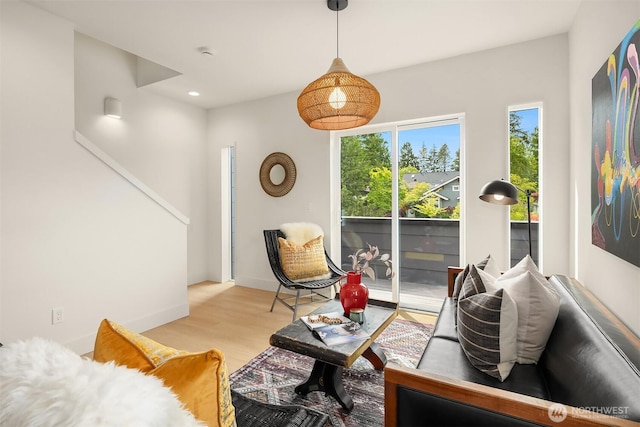 3650 51st Ave SW Unit B, Seattle, WA 98116 - living area featuring wood finished floors and recessed lighting