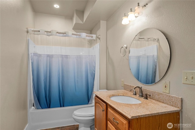 full bathroom featuring vanity, toilet, and shower / tub combo
