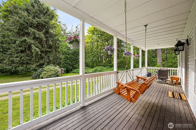 19303 228th Ave SE, Maple Valley, WA 98038 - deck featuring covered porch and a lawn