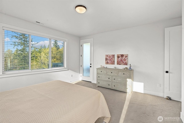 bedroom with carpet flooring and visible vents