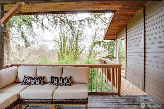 deck with an outdoor hangout area
