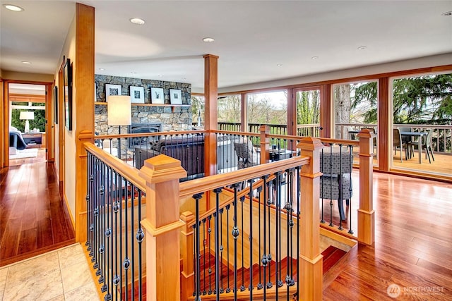 interior space featuring a wealth of natural light, wood finished floors, and recessed lighting