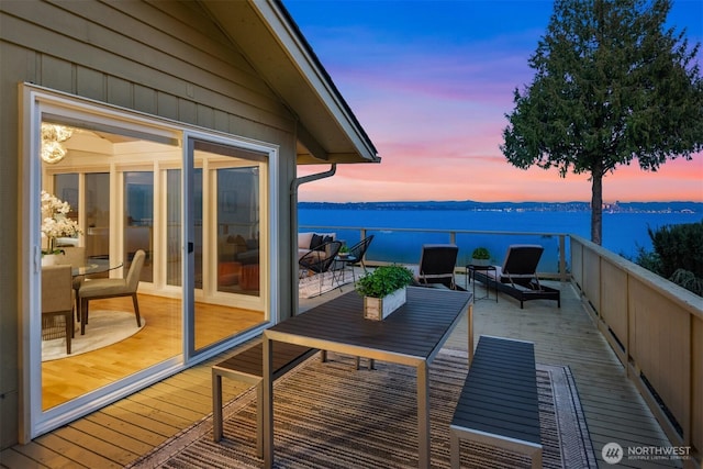10837 Bill Point Blf NE, Bainbridge Island, WA 98110 - balcony at dusk with a water view